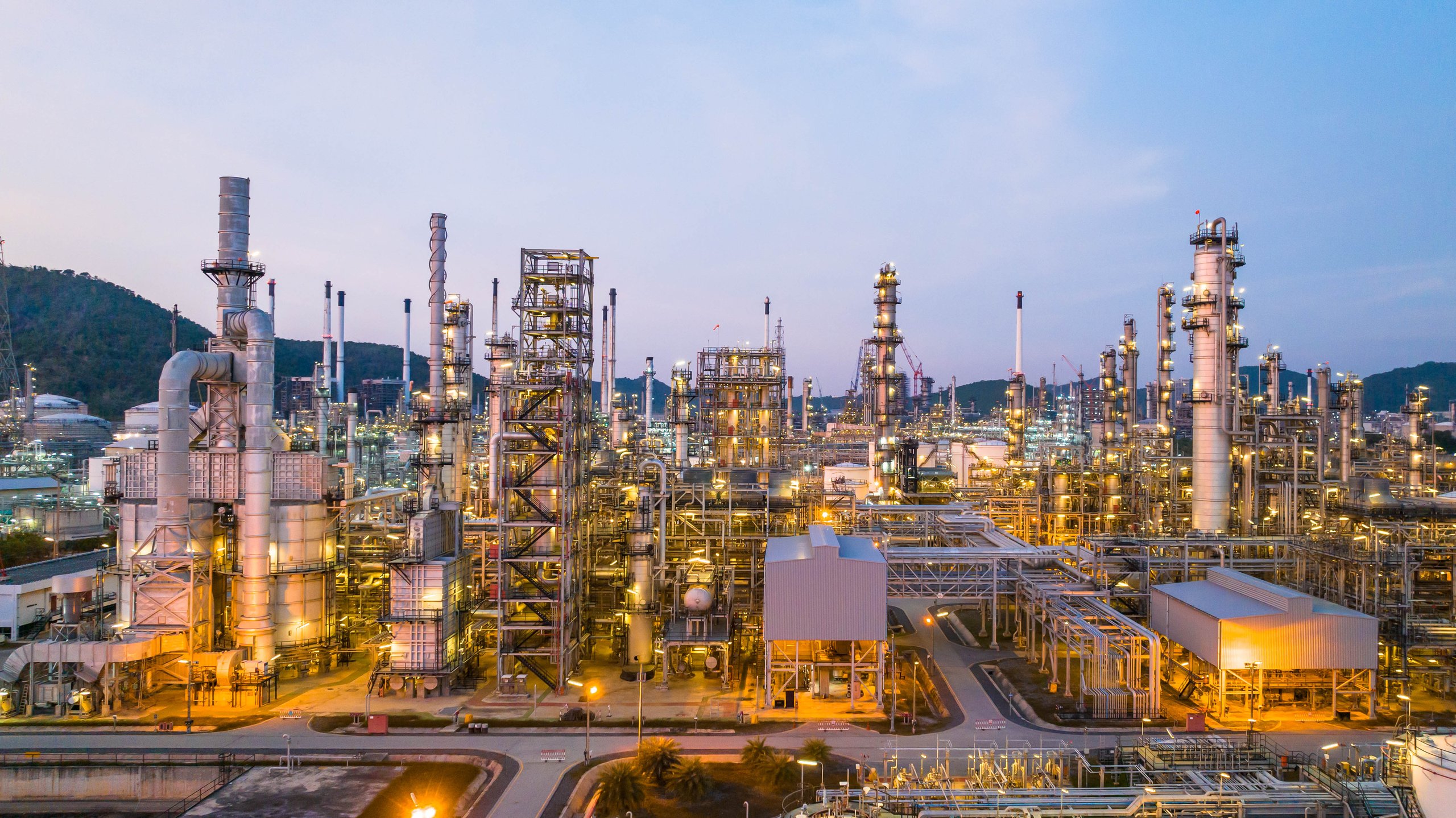 Oil and gas industrial refinery at twilight